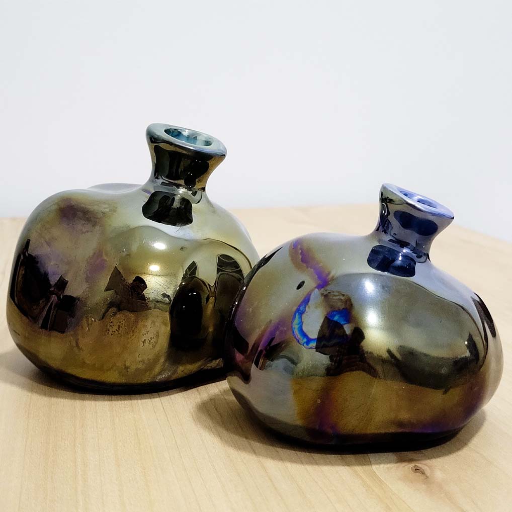 Glazed ceramic pomegranate used as handcrafted ceramic art in an elegant interior