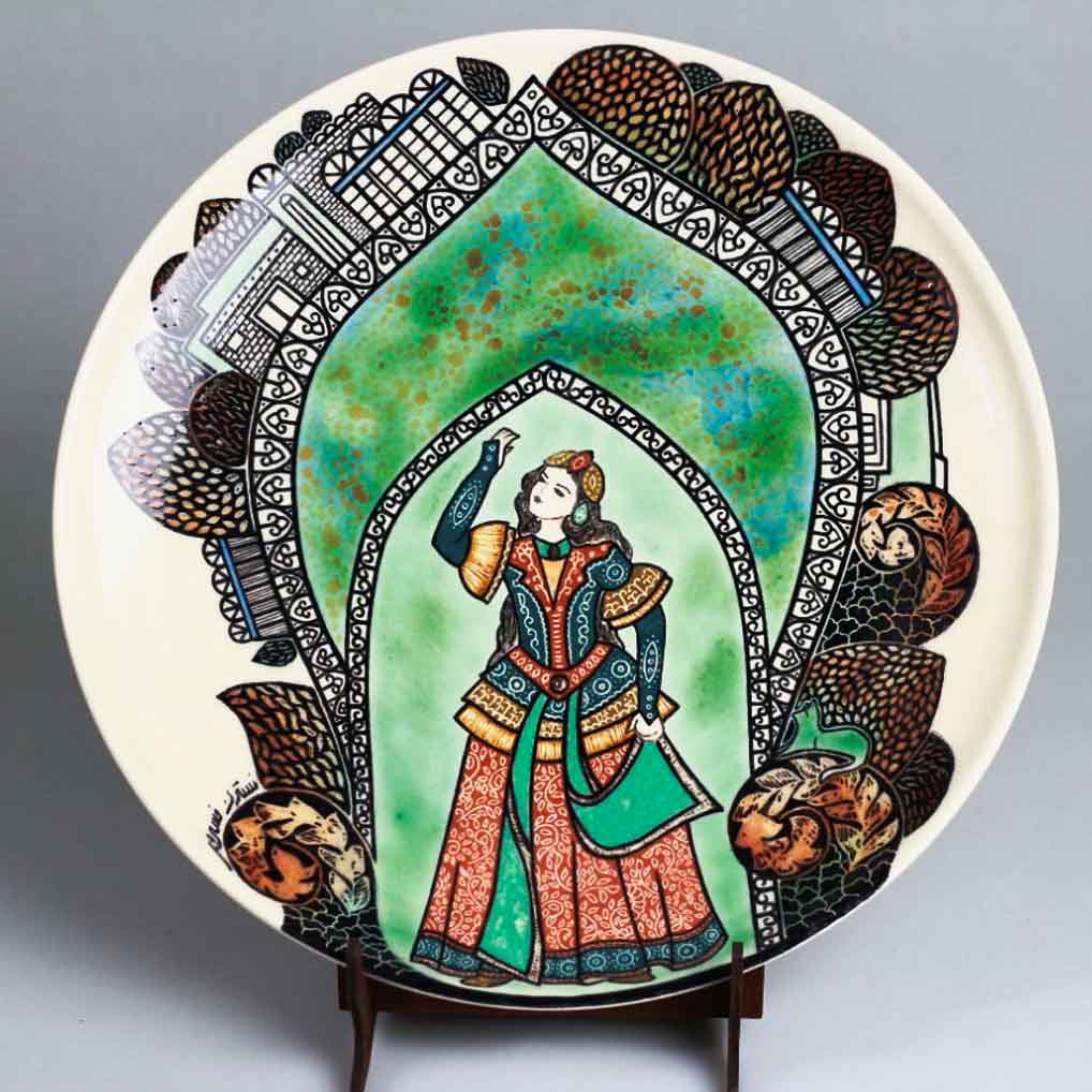 Close-up of hand-painted ceramic decor showing brushwork and surface detail
