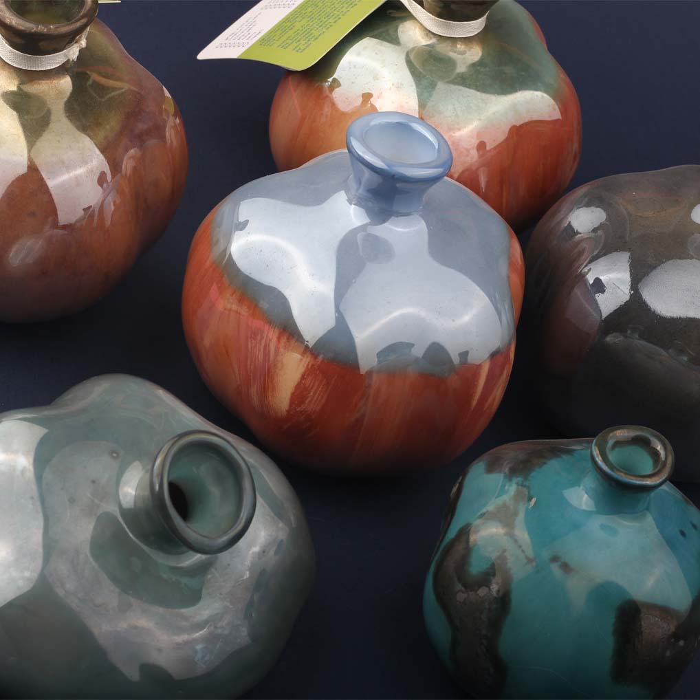 Close-up of handcrafted ceramic glaze showing texture, colour and surface detail