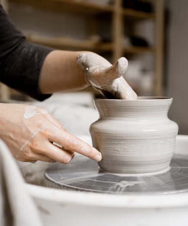Handmade ceramics compared with mass-produced ceramic decor in a refined interior