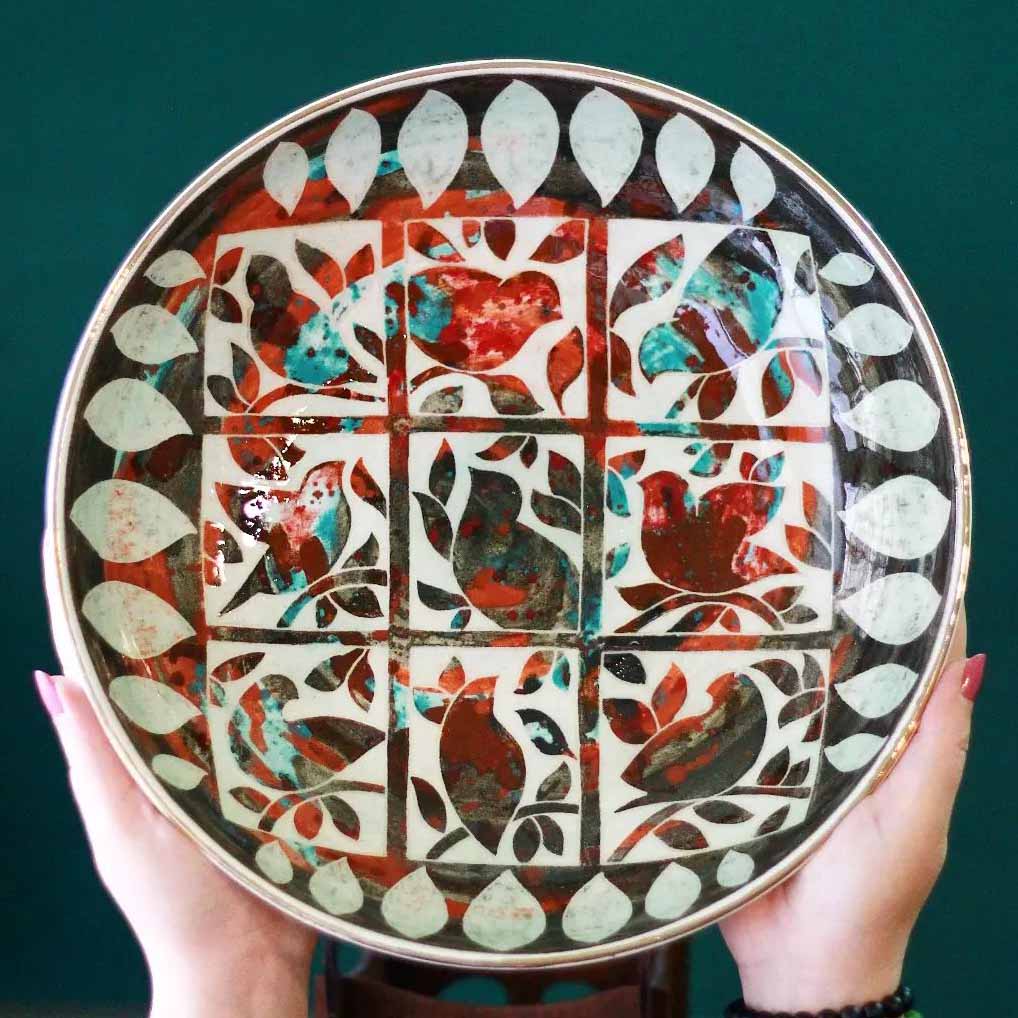 Statement ceramic dish decor styled as a focal point in a living room